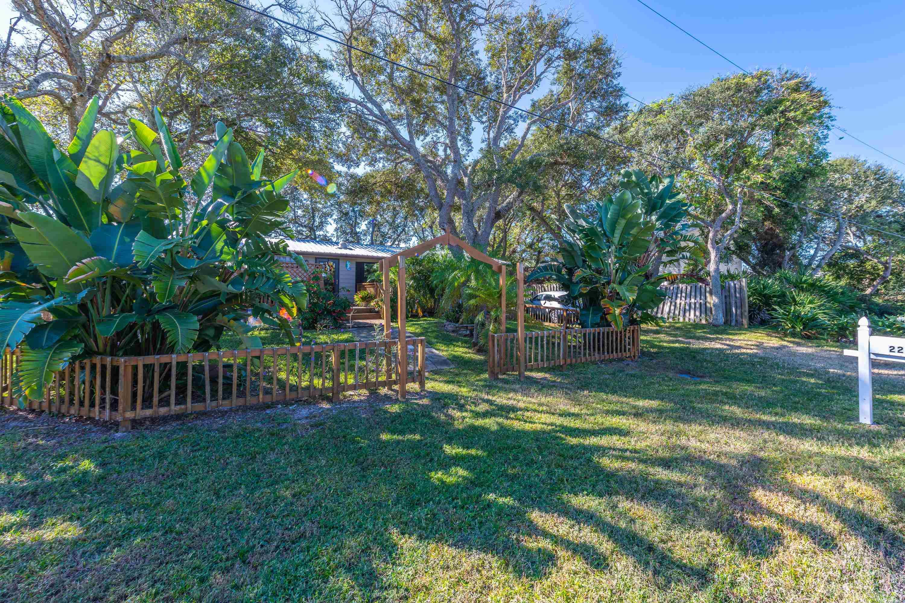 229 Barco Road St. Augustine, FL 32080 - Photo 3 of 46 a view of house with backyard and a slide