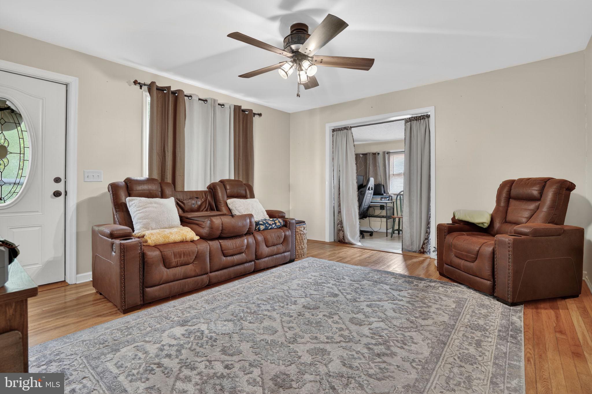 7278 Fleming Road New Church, VA 23415 - Photo 5 of 44 a living room with furniture and a window
