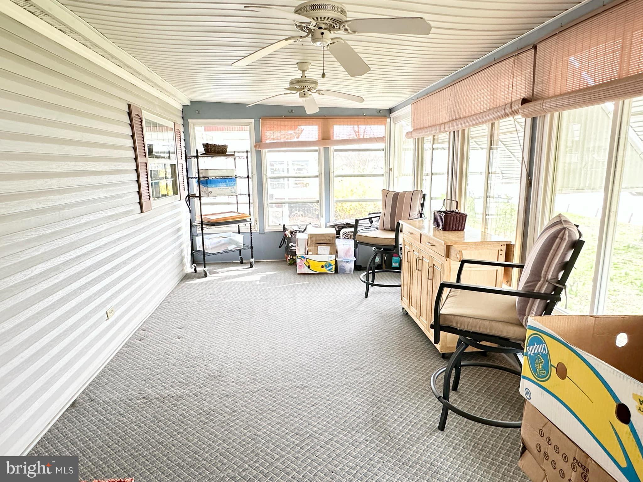 314 John Alden Drive Buena, NJ 08310 - Photo 12 of 23 a living room with furniture and a large window