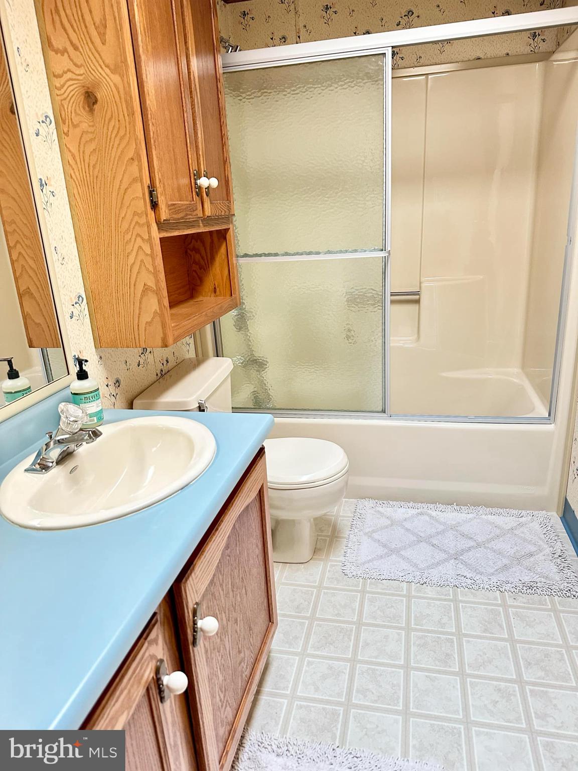 314 John Alden Drive Buena, NJ 08310 - Photo 19 of 23 a bathroom with a sink a toilet and a mirror