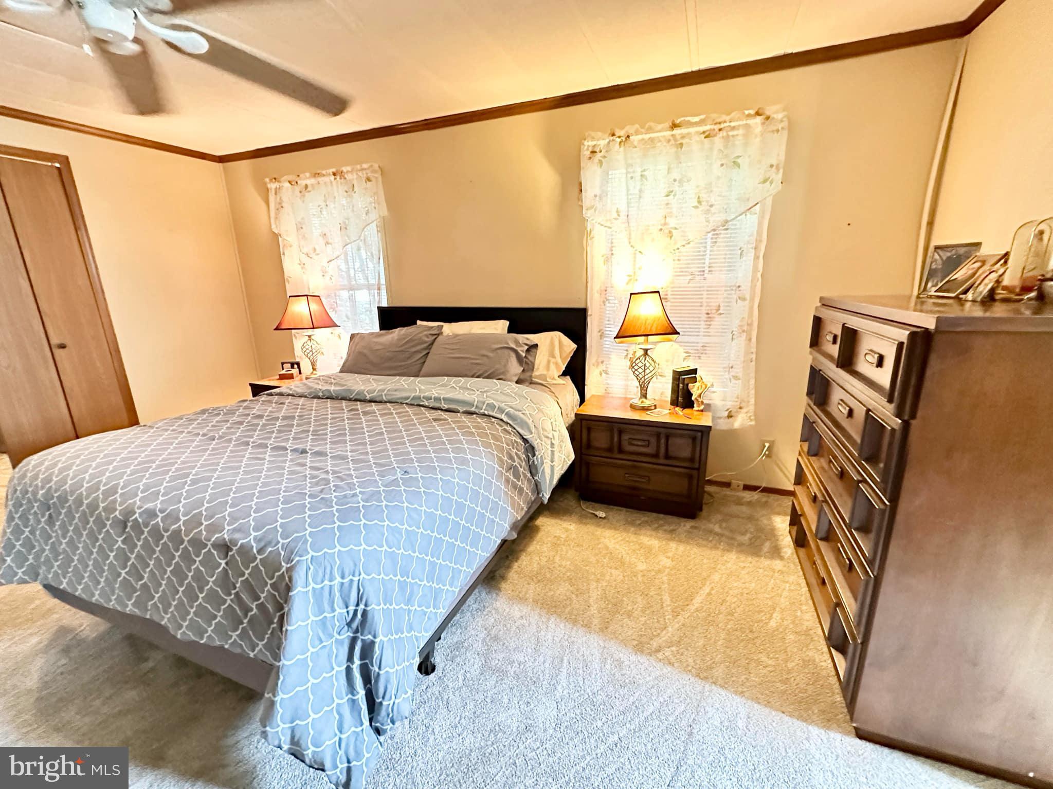 314 John Alden Drive Buena, NJ 08310 - Photo 21 of 23 a bedroom with a bed and a window