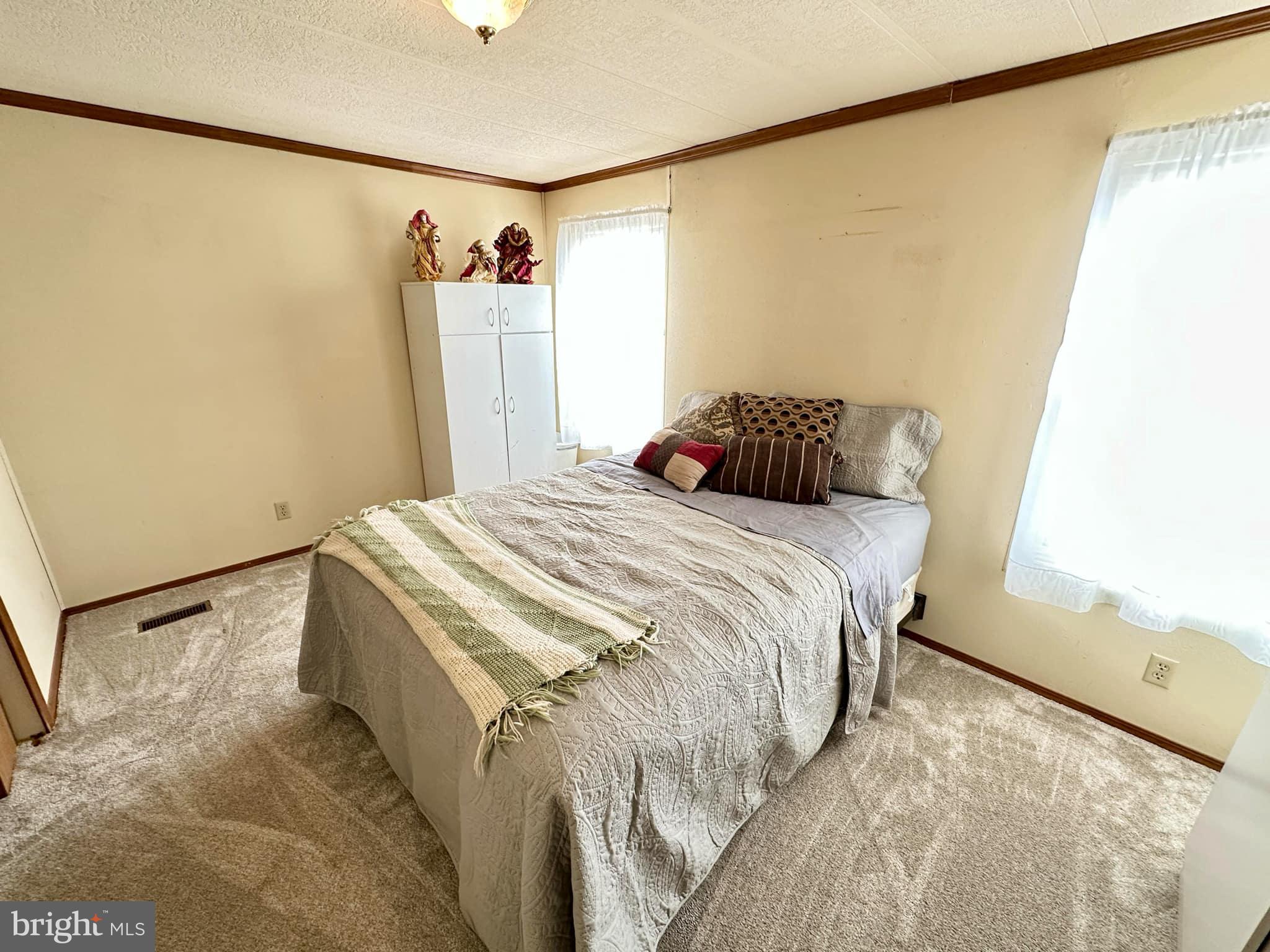 314 John Alden Drive Buena, NJ 08310 - Photo 23 of 23 a bedroom with a bed and a window in it