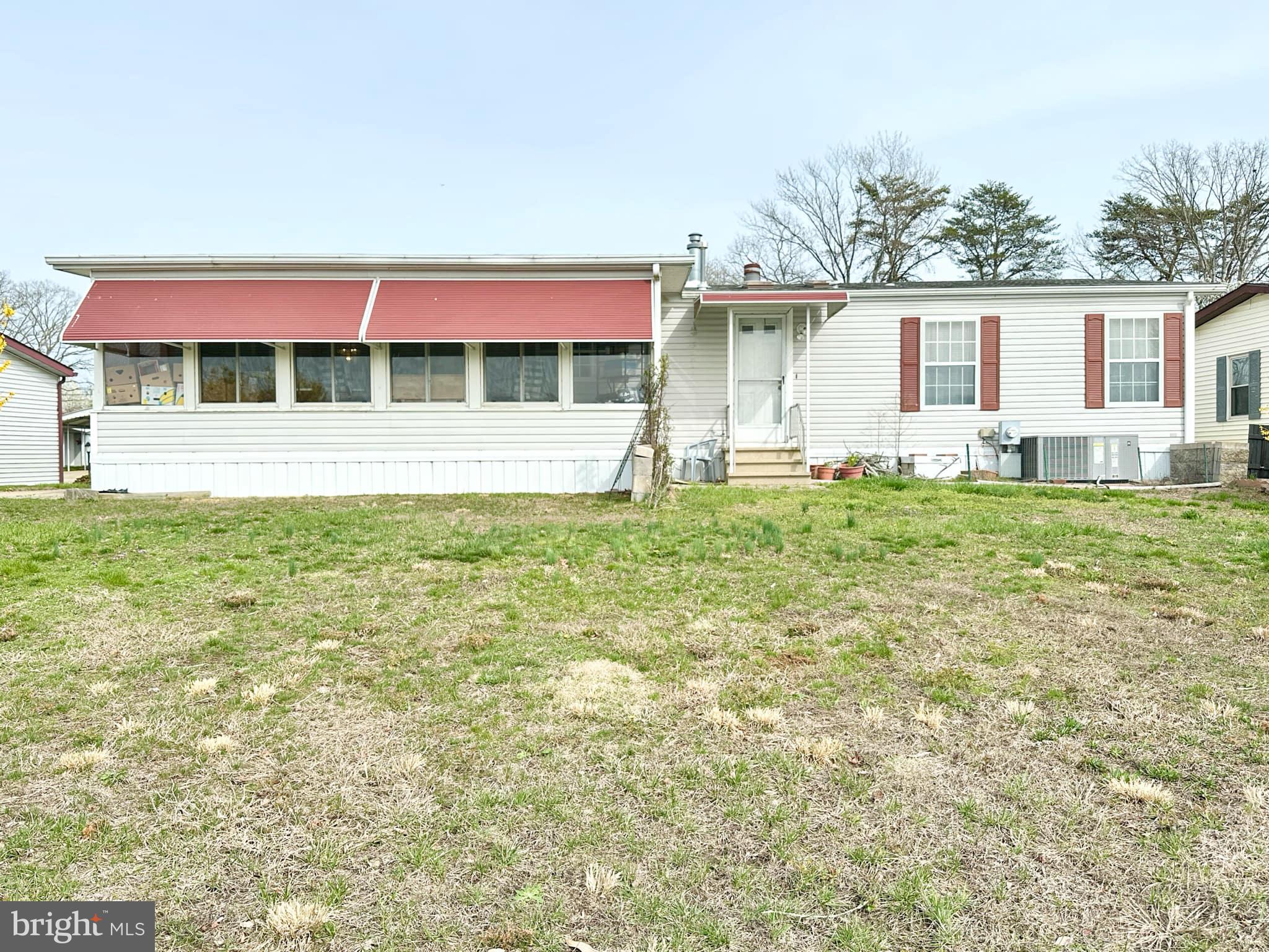 314 John Alden Drive Buena, NJ 08310 - Photo 3 of 23 a view of a house with a yard and sitting area