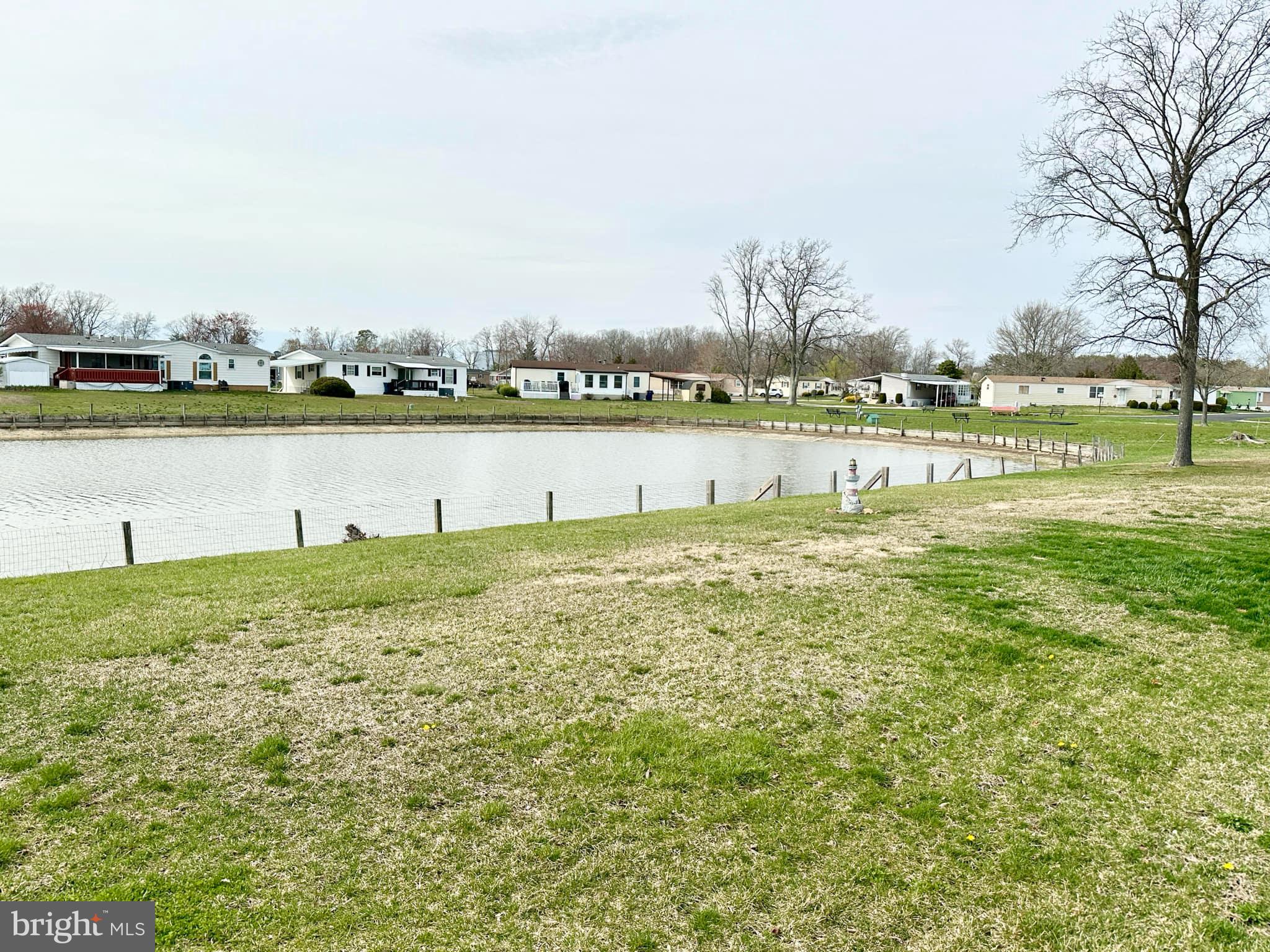 314 John Alden Drive Buena, NJ 08310 - Photo 4 of 23 a view of a lake with houses