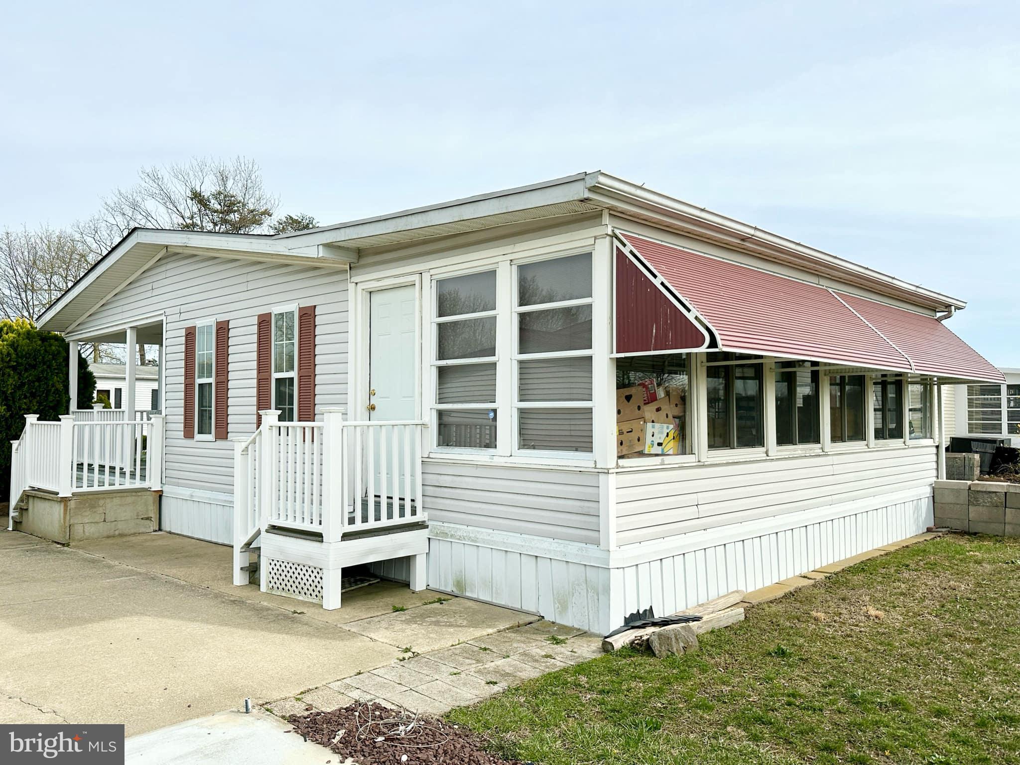 314 John Alden Drive Buena, NJ 08310 - Photo 7 of 23 a view of house with a yard