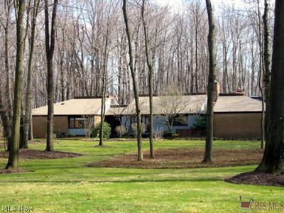 4500 Shaw Road Akron, OH 44333 - Photo 1 of 1 This custom built home is nestled on almost four acres with magnificent landscaping...