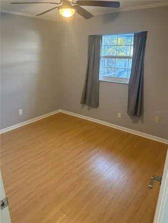 en empty room with windows