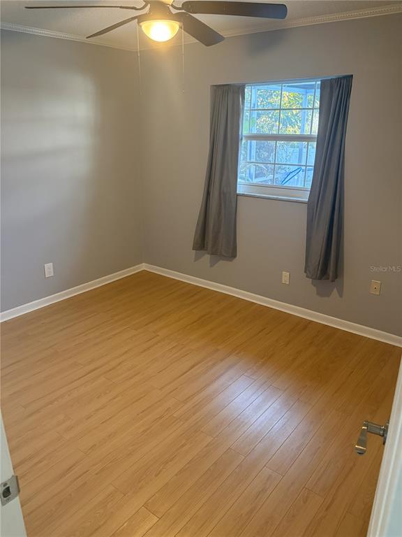 Undisclosed Address St. Petersburg, FL 33708 - Photo 4 of 11 en empty room with windows