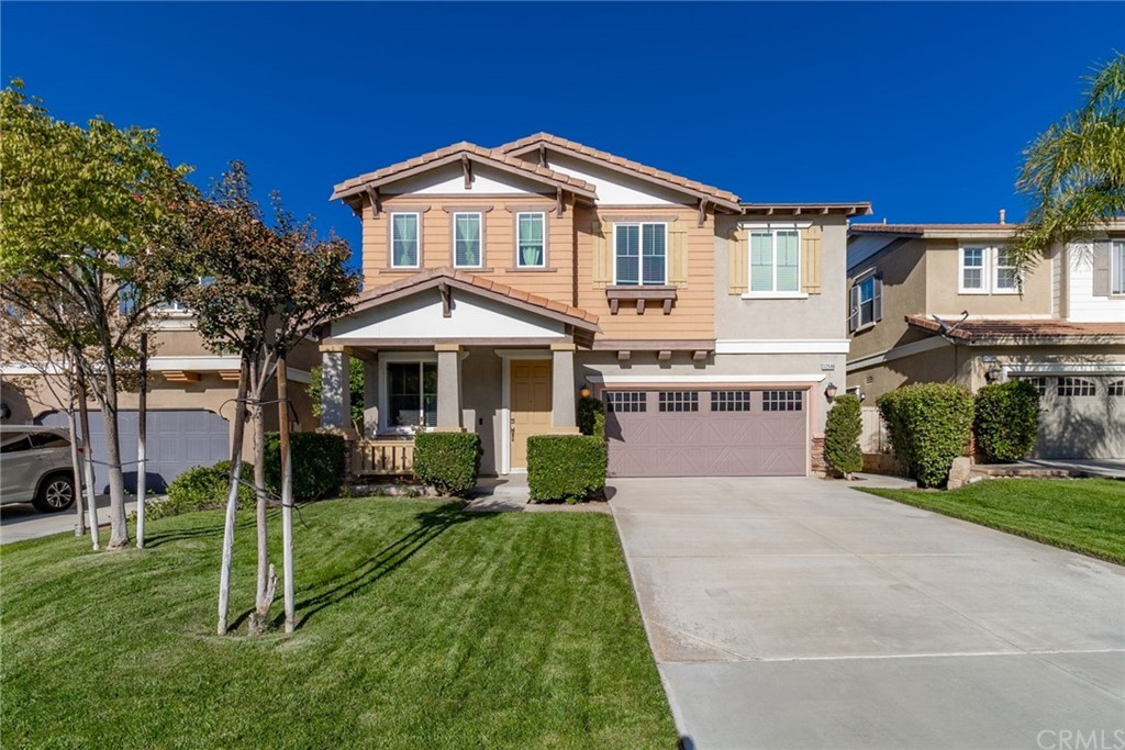 32588 Ritter Court Temecula, CA 92592 - Photo 1 of 1 a front view of a house with a yard and porch