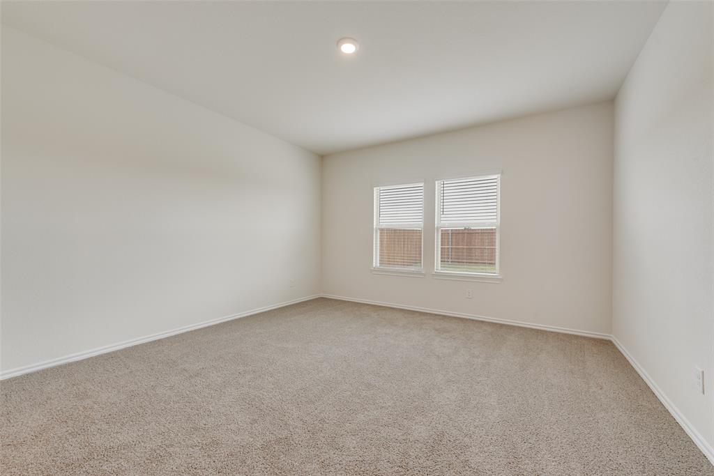 1428 Millstead Rill Drive Caddo Mills, TX 75135 - Photo 13 of 24 an empty room with a window