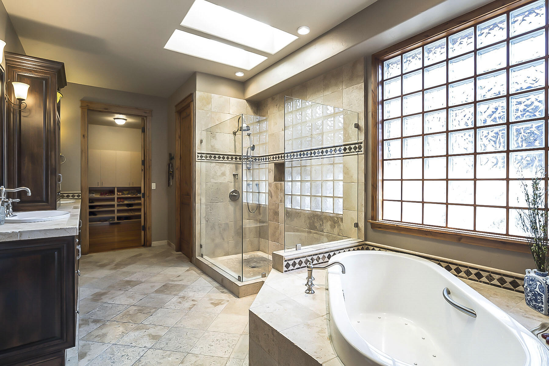 19436 Green Lakes Loop Bend, OR 97702 - Photo 36 of 53 Luxurious en suite with large tile shower and spa tub.
