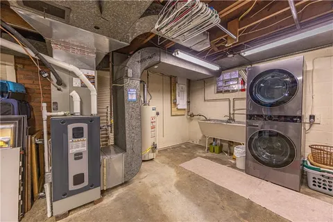 a view of a hallway with washer and dryer