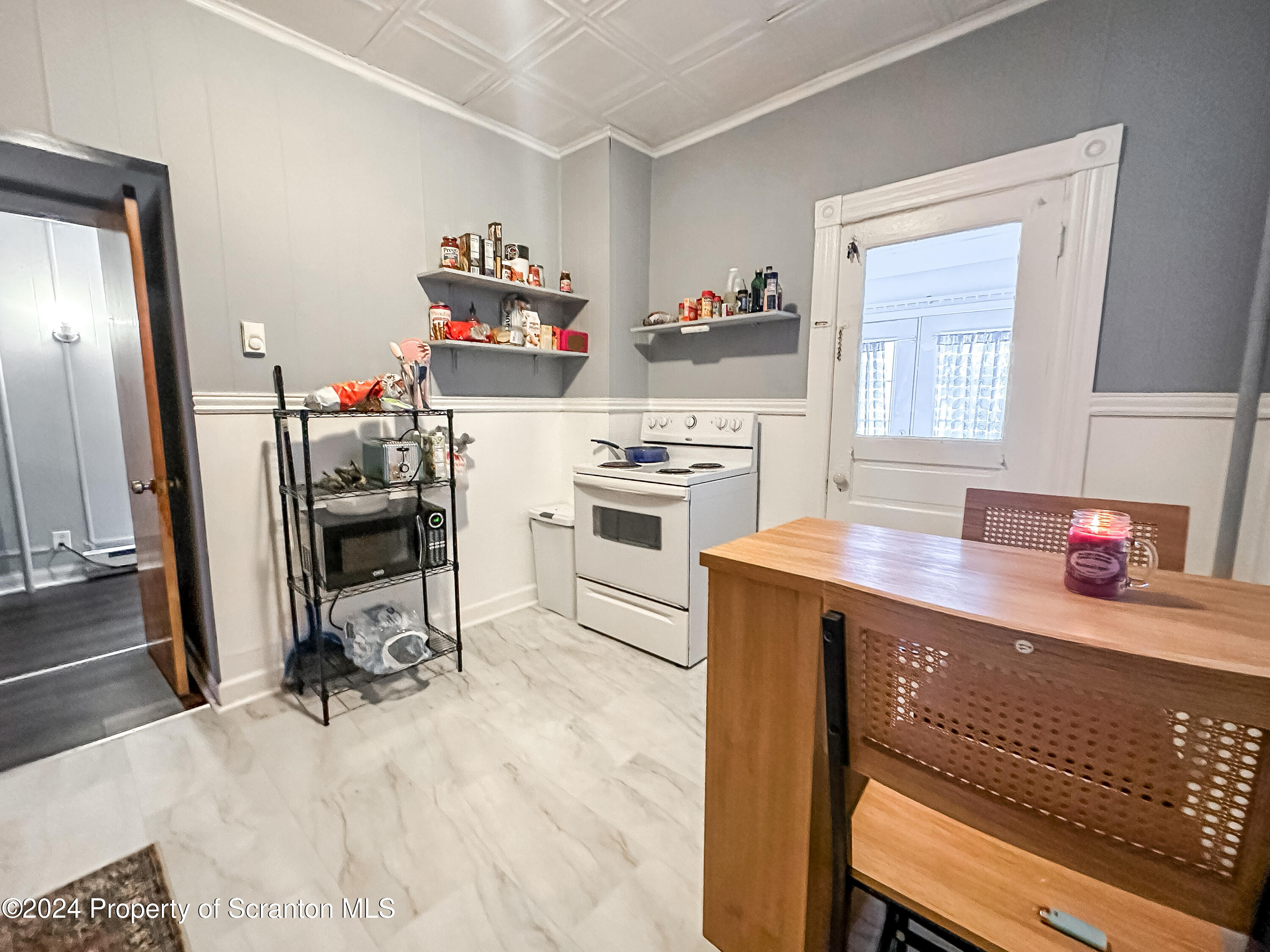 218 Hand Street Jessup, PA 18434 - Photo 11 of 32 a kitchen with a sink cabinets and wooden floor
