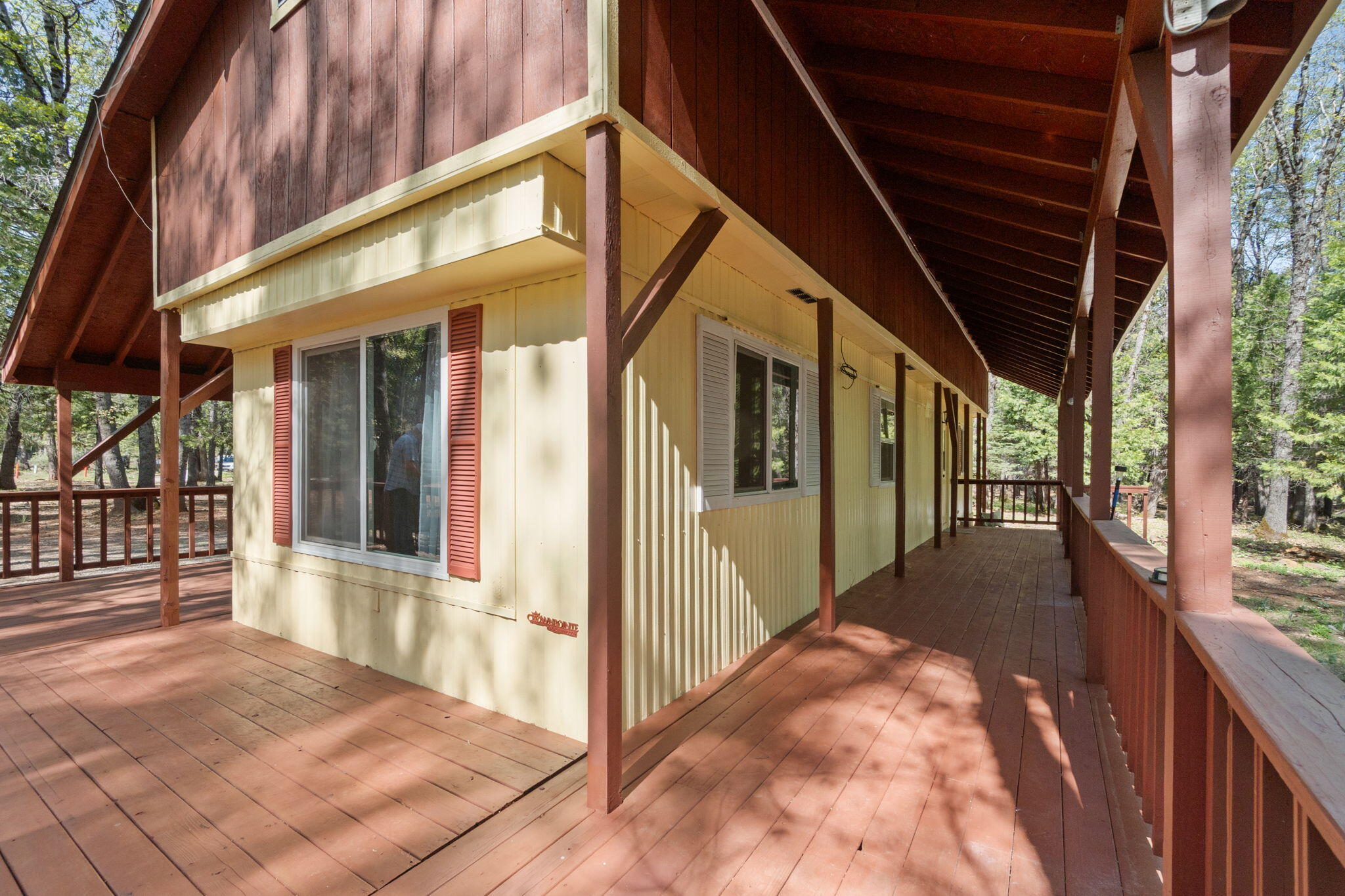 7517 Brett Road Shingletown, CA 96088 - Photo 16 of 26 a view of a house with a porch