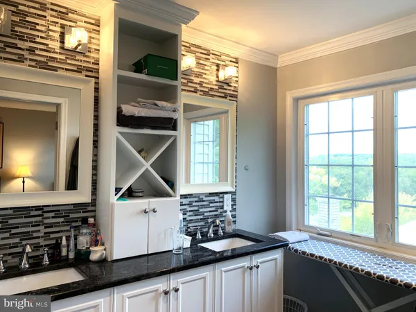 a kitchen with a sink and a window