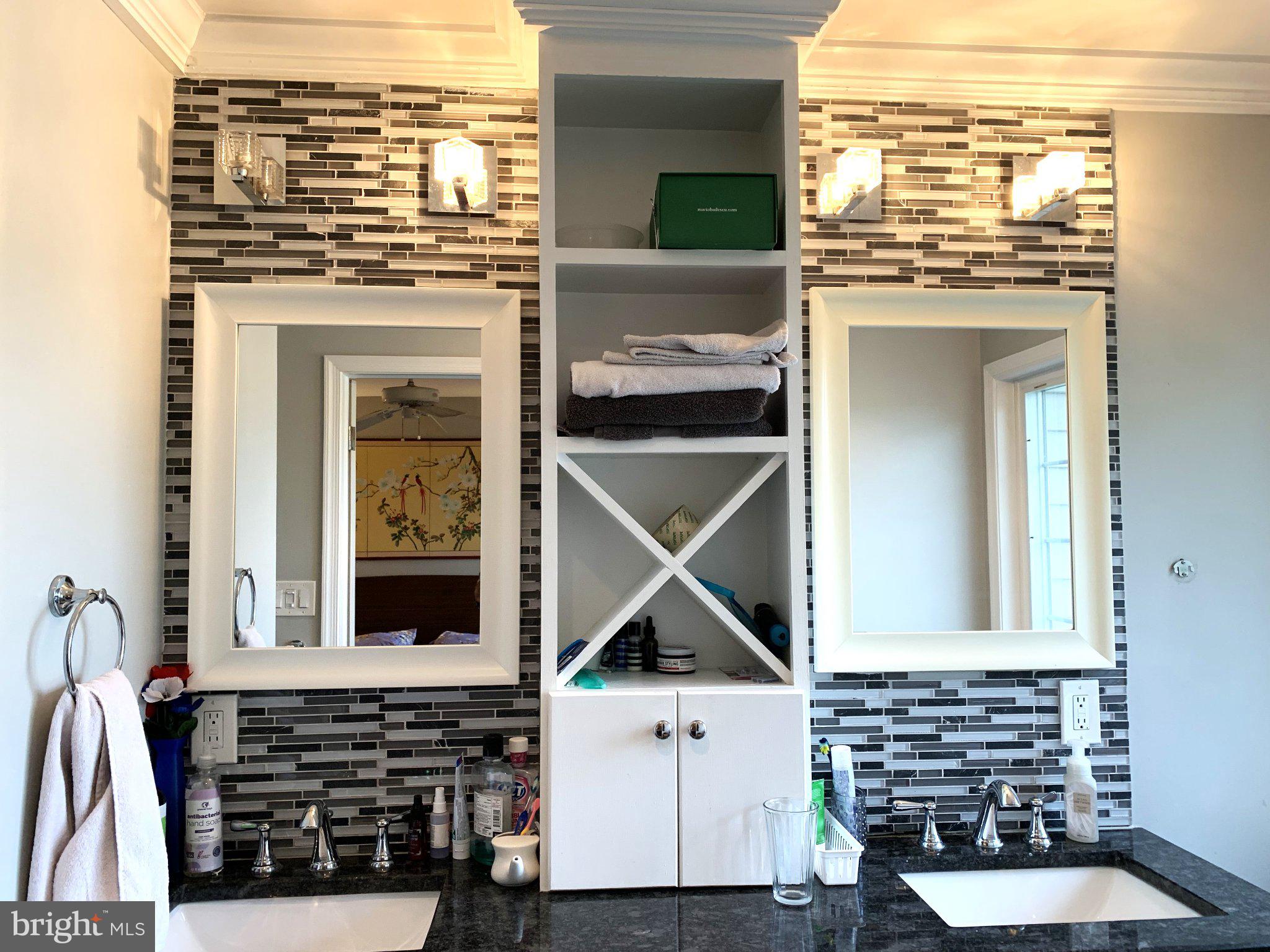 11 Cabot Drive Chesterbrook, PA 19087 - Photo 21 of 35 Sleek modern bathroom with stylish mirrors.