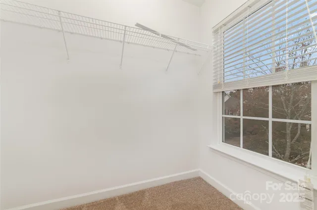 a bathroom with a granite countertop sink a toilet and a bathtub