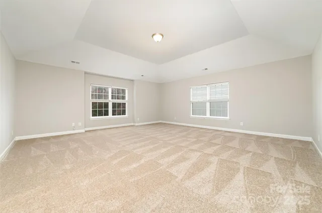 a view of a refrigerator in kitchen