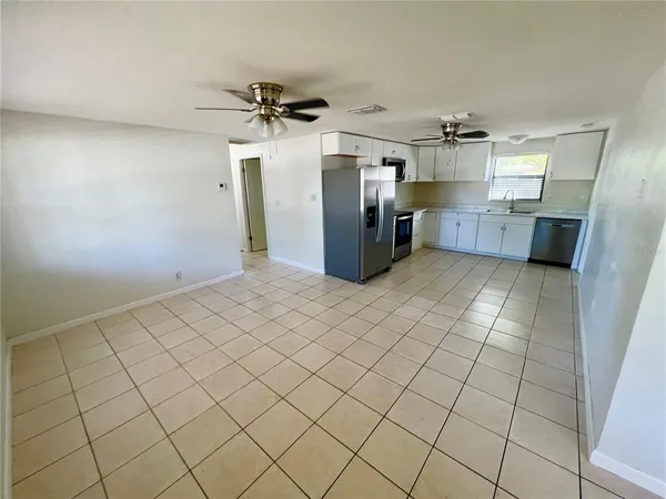 a bathroom with a toilet a sink and a bathtub