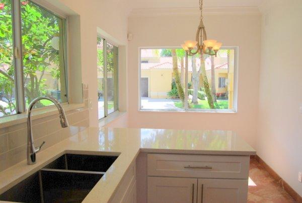 10473 Lake Vista Circle Boca Raton, FL 33498 - Photo 13 of 22 a view of a kitchen with a sink and dishwasher