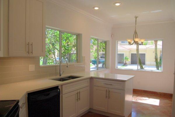 10473 Lake Vista Circle Boca Raton, FL 33498 - Photo 14 of 22 a kitchen with a sink and large window