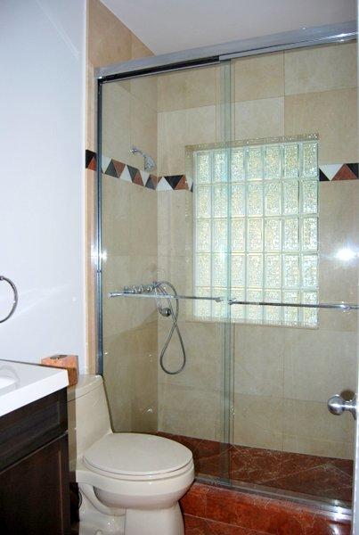 10473 Lake Vista Circle Boca Raton, FL 33498 - Photo 15 of 22 a bathroom with a toilet and shower