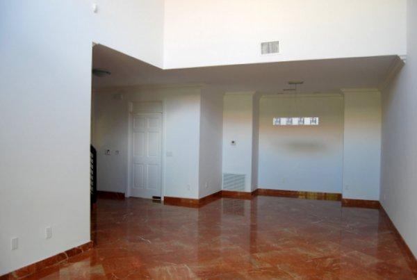 10473 Lake Vista Circle Boca Raton, FL 33498 - Photo 9 of 22 an empty room with windows