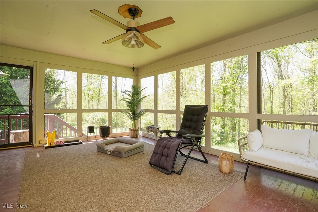 7780 Knauf Road Canfield, OH 44406 - Photo 31 of 48 Sunroom / screened in deck with a ceiling fan and plenty of natural light