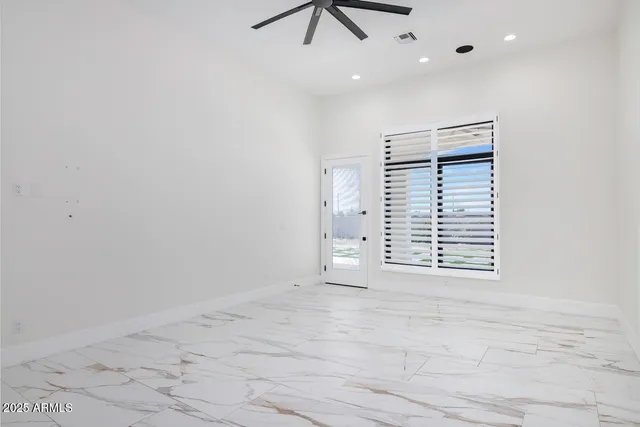 a bathroom with a sink vanity and mirror