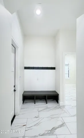 a view of a room with a large window and an outdoor view