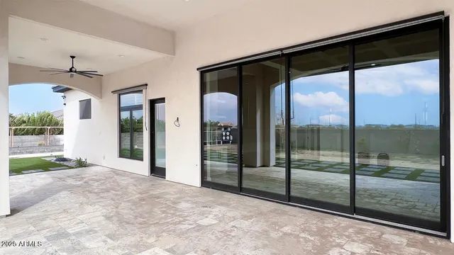 a view of a porch and garden