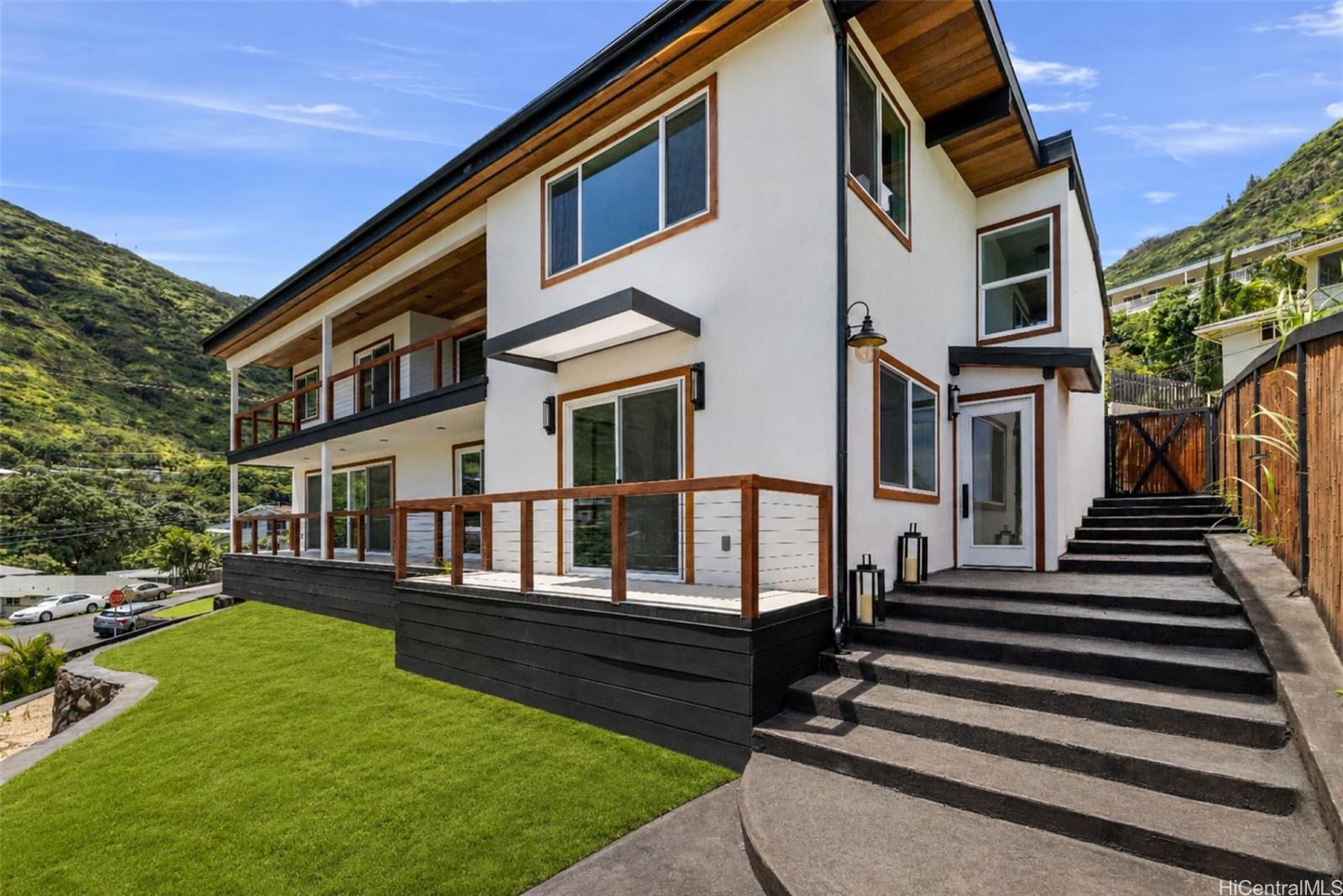 852 Kainoa Place Honolulu, HI 96821 - Photo 20 of 25 a view of a house with backyard and sitting area