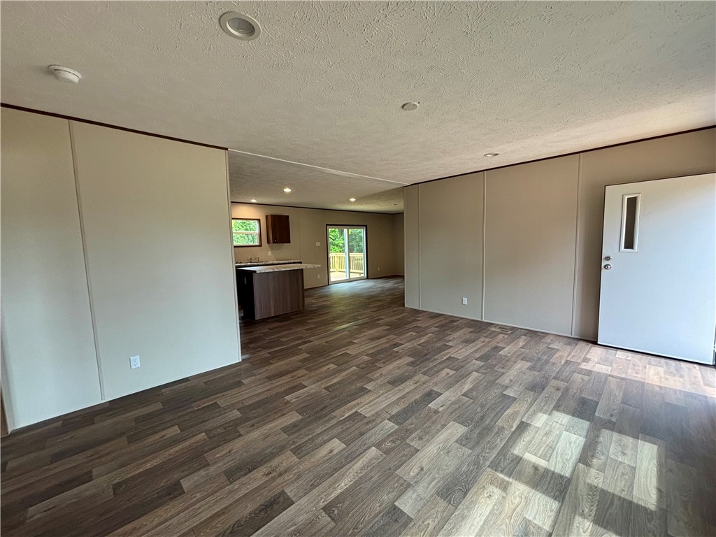 703 Double Springs Road Townville, SC 29689 - Photo 8 of 22 This bright and airy living space seamlessly connects to the kitchen and outdoor views.