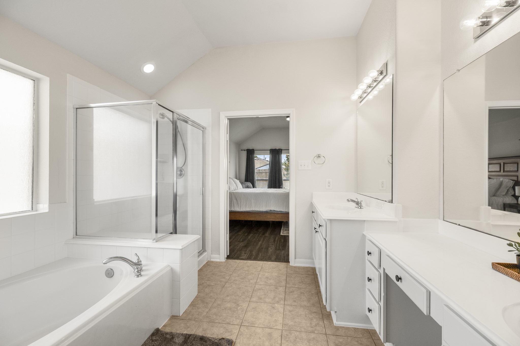 3422 Falcon Trail Court Spring, TX 77373 - Photo 18 of 35 a spacious bathroom with a tub sink shower and mirror