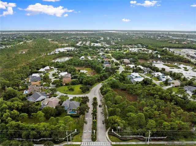 an aerial view of a city with lots of residential buildings