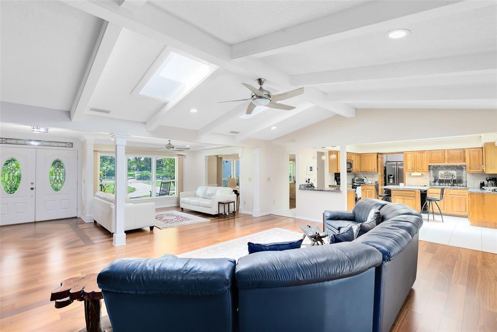111 Variety Tree Circle Altamonte Springs, FL 32714 - Photo 6 of 35 Natural light floods in through the skylights, illuminating the room with a warm and inviting glow throughout the day.