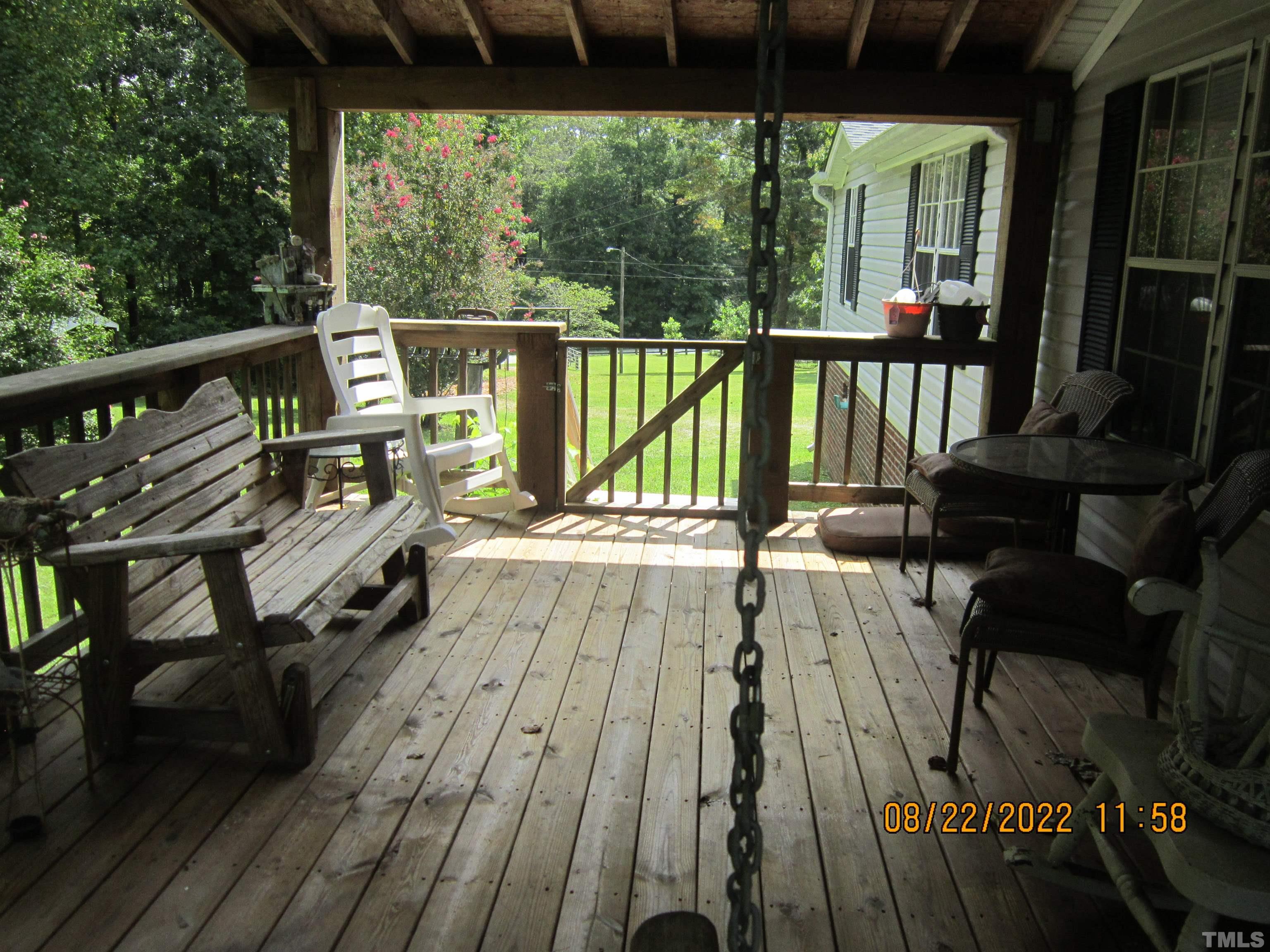 1290 Mann Oakley Road Rougemont, NC 27572 - Photo 21 of 29 a view of deck with chairs and wooden floor