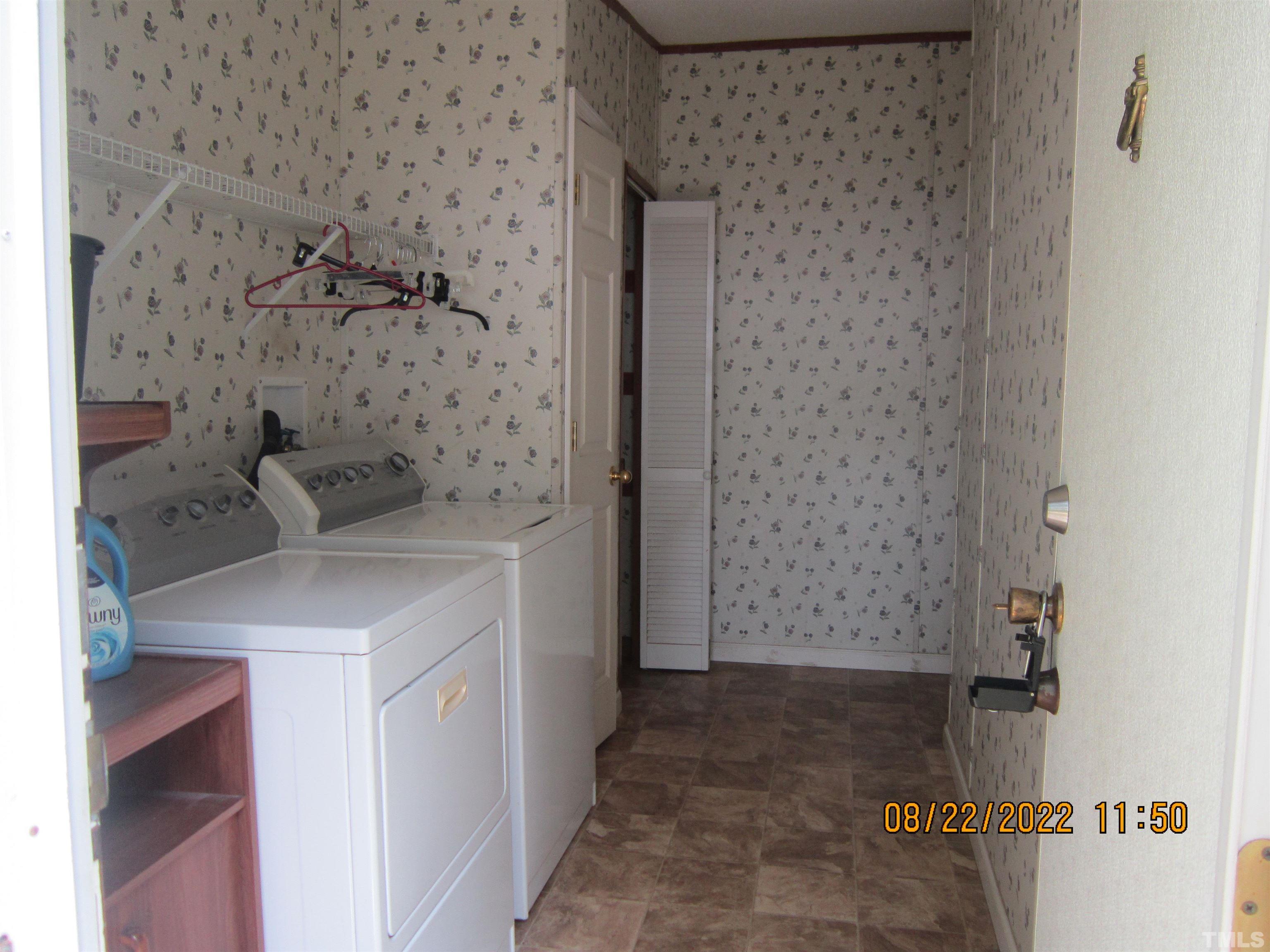 1290 Mann Oakley Road Rougemont, NC 27572 - Photo 10 of 29 a bathroom with a sink and mirror