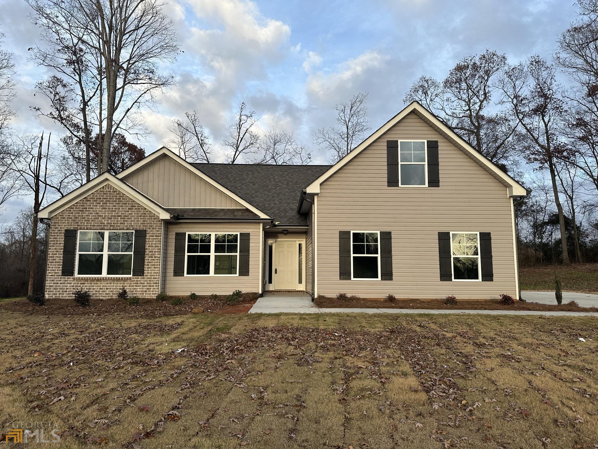 5240 Sandy Cross Road, Unit 12 Carnesville, GA 30521 - Photo 1 of 1 front view of a house with a yard