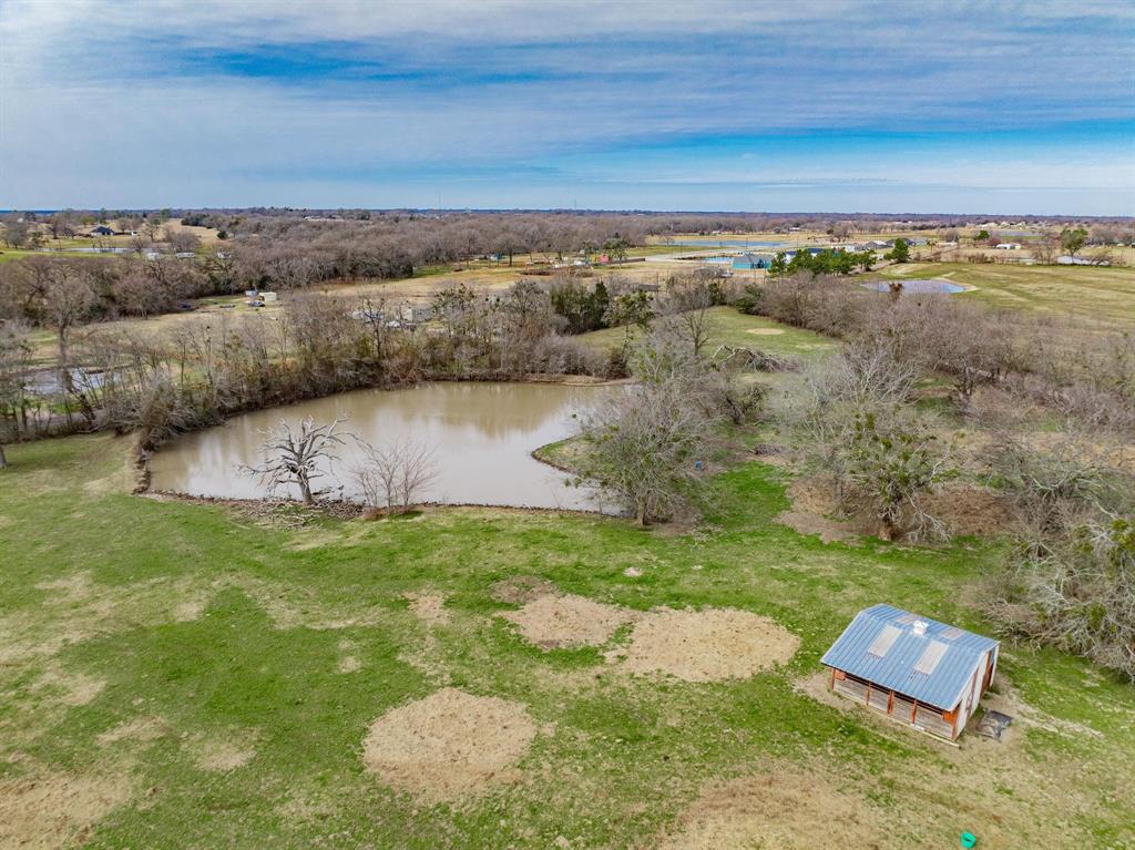 352 Rs County Road 1605 Point, TX 75472 - Photo 20 of 30 a view of a lake with a mountain in the background