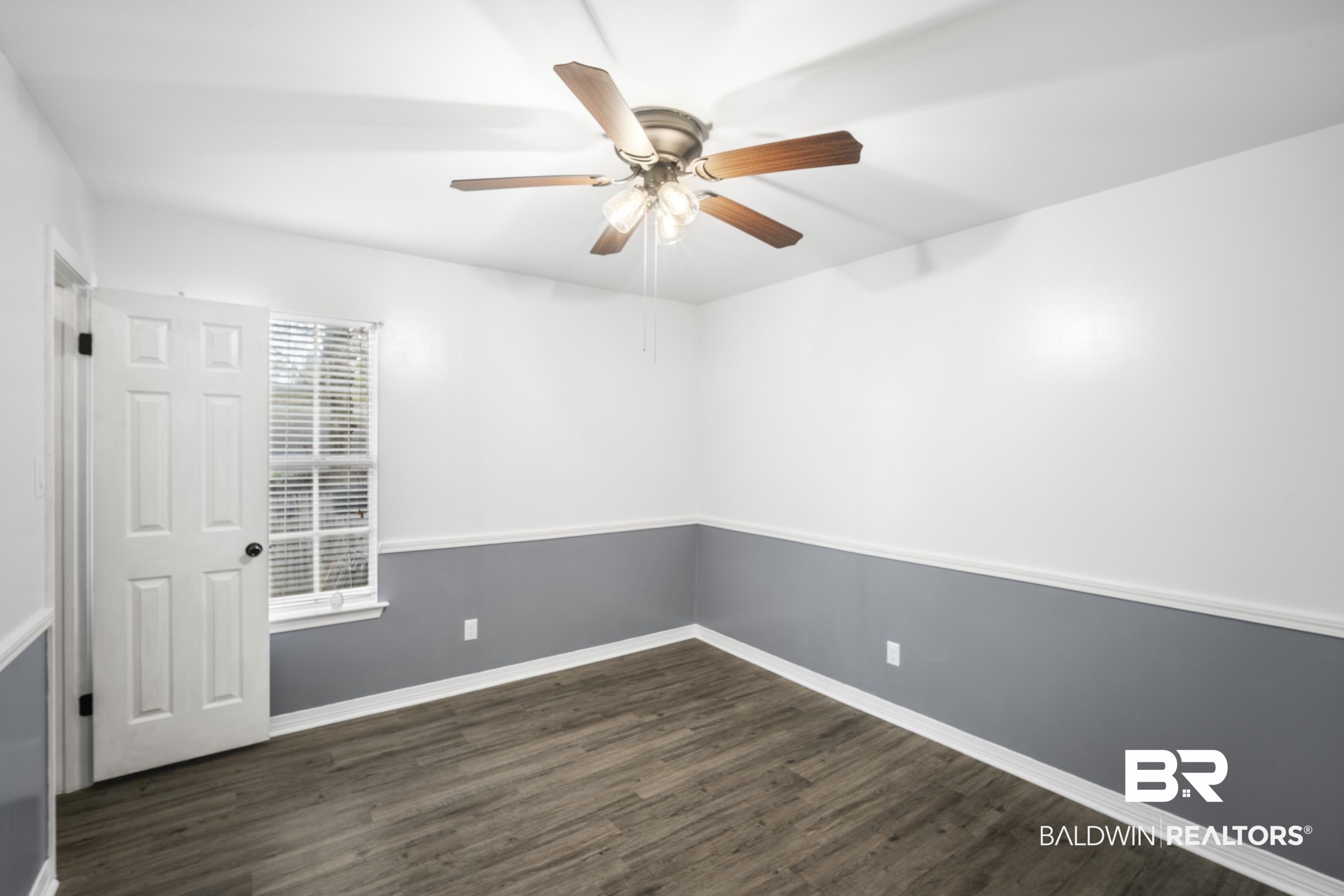3101 Autumn Ridge Drive West Mobile, AL 36695 - Photo 21 of 36 Spare room featuring dark wood-type flooring and ceiling fan