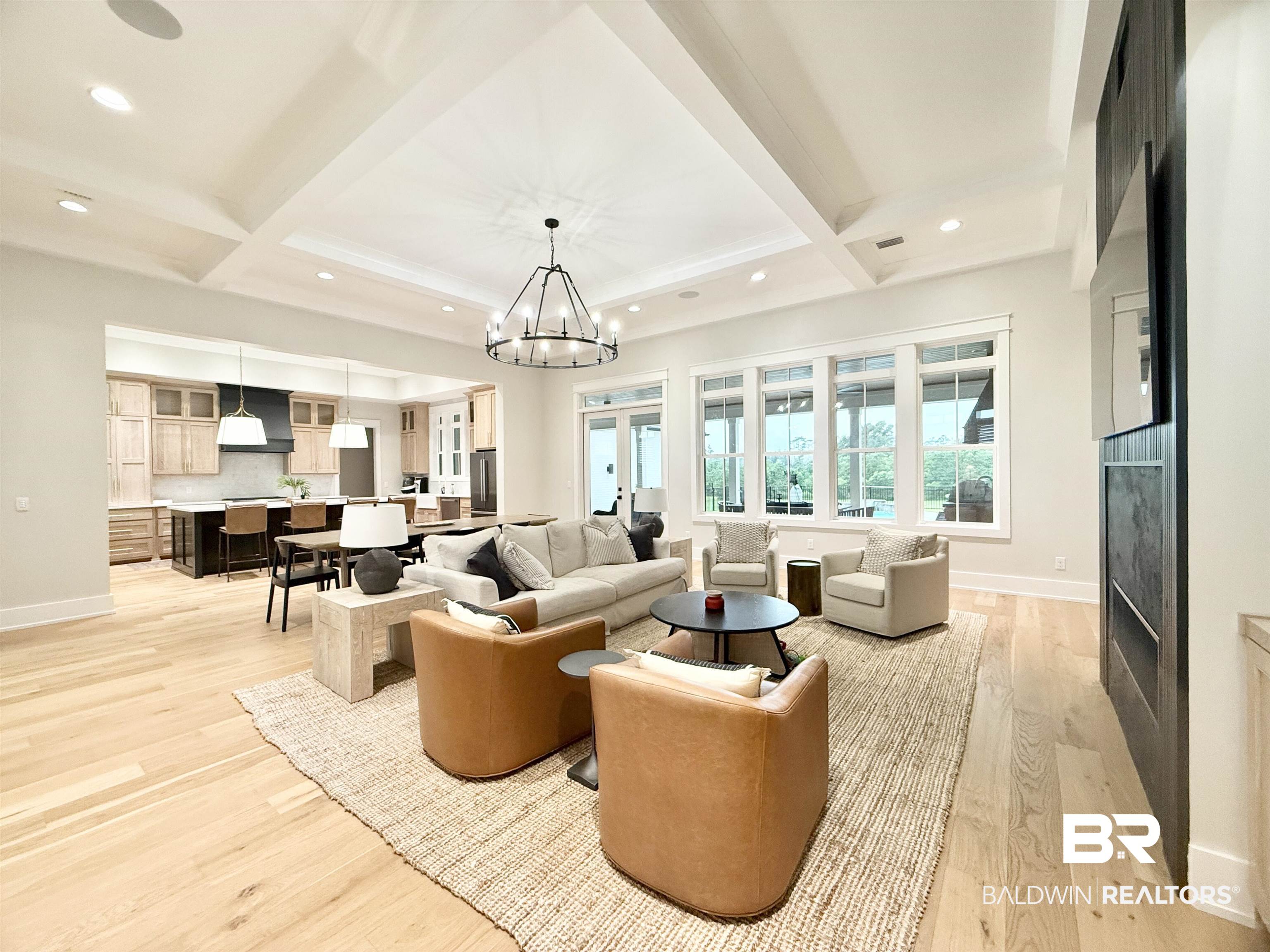 21767 Gallery Boulevard Fairhope, AL 36532 - Photo 7 of 74 Living room featuring beamed ceiling, coffered ceiling, light wood-style floors, recessed lighting, and a high end fireplace