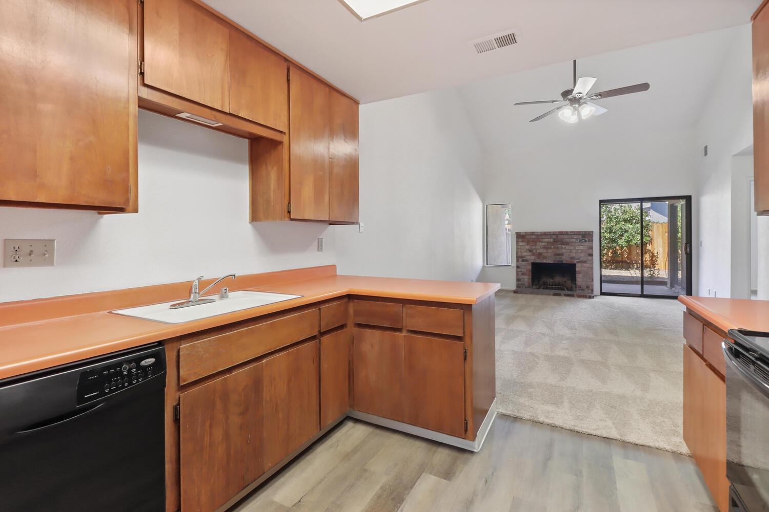 1213 Arthur Street Davis, CA 95616 - Photo 16 of 42 a kitchen with a sink cabinets and appliances