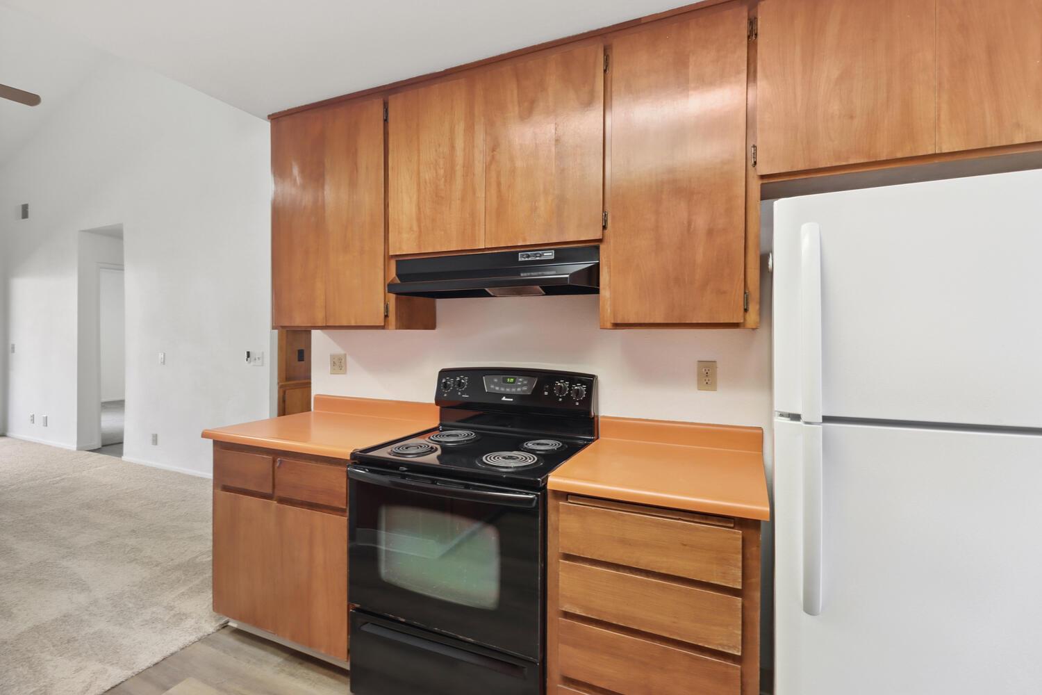 1213 Arthur Street Davis, CA 95616 - Photo 17 of 42 a kitchen with a stove and a refrigerator