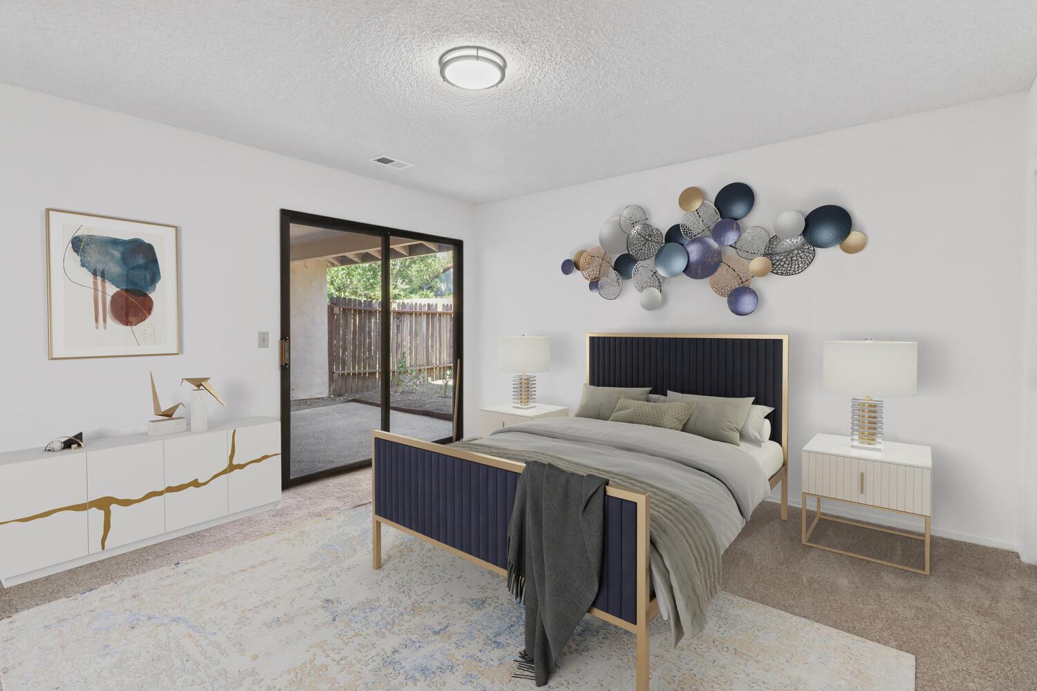 1213 Arthur Street Davis, CA 95616 - Photo 22 of 42 a bedroom with a bed and a couch