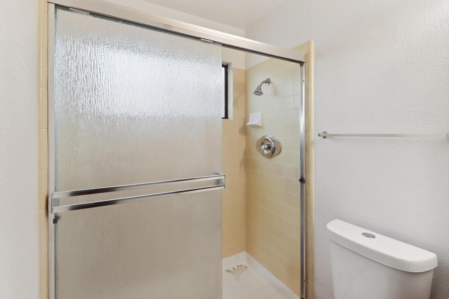 1213 Arthur Street Davis, CA 95616 - Photo 28 of 42 a bathroom with a shower and a toilet