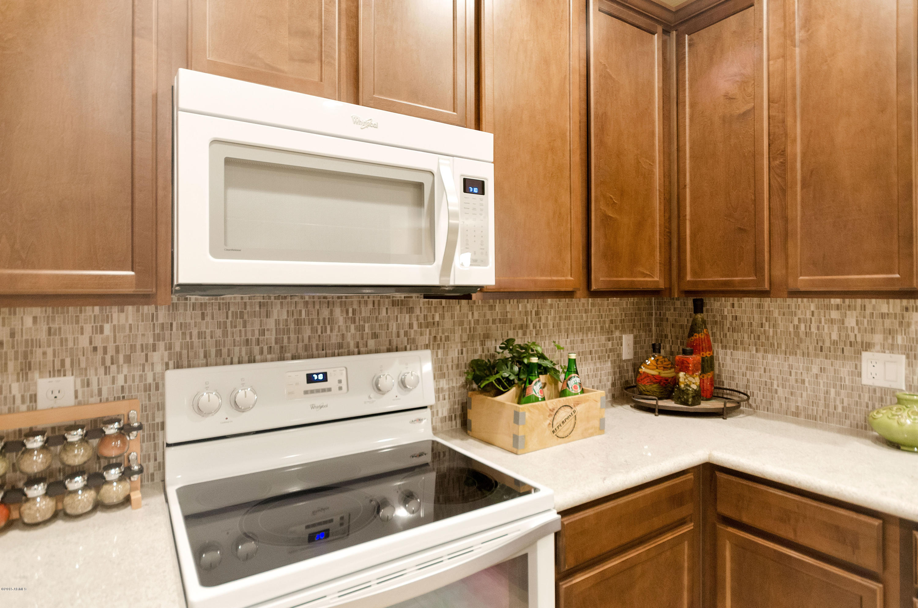 7726 East Baseline Road, Unit 225 Mesa, AZ 85209 - Photo 27 of 27 Stove and backsplash