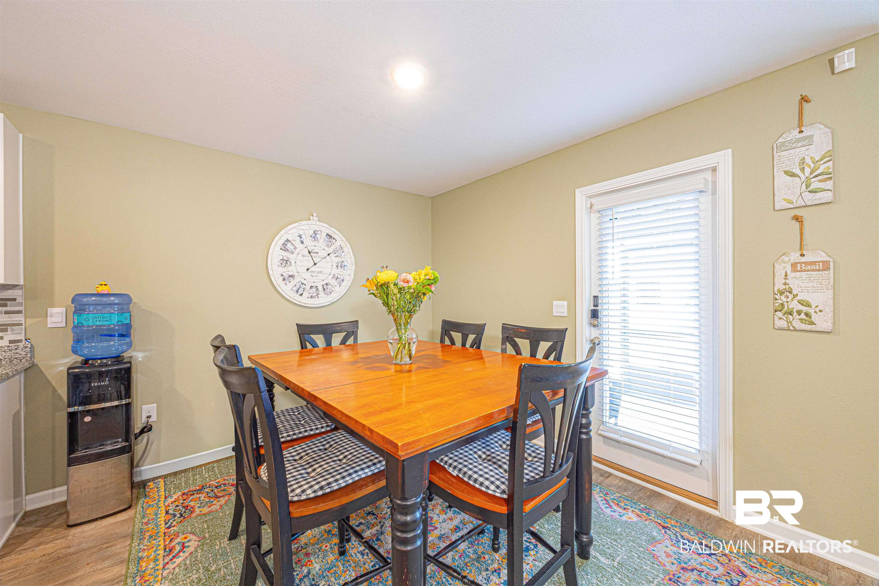 14843 Forsythia Loop Silverhill, AL 36576 - Photo 18 of 51 Dining room featuring baseboards and light wood-style flooring