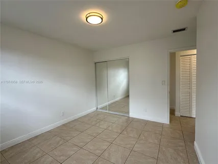 an empty room with a natural light