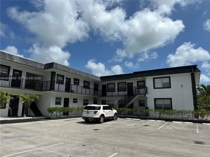 a car parked in front of a house